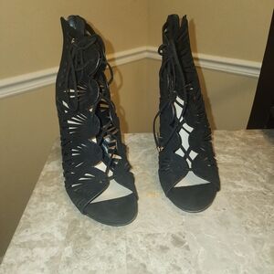 Black Heels with High Stiletto and Intricate Cut-Out Design